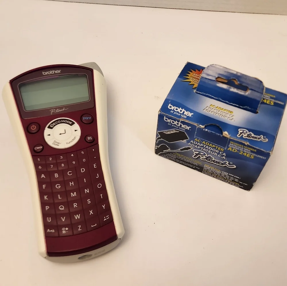 Brother Maroon and White Label Maker with Adapter